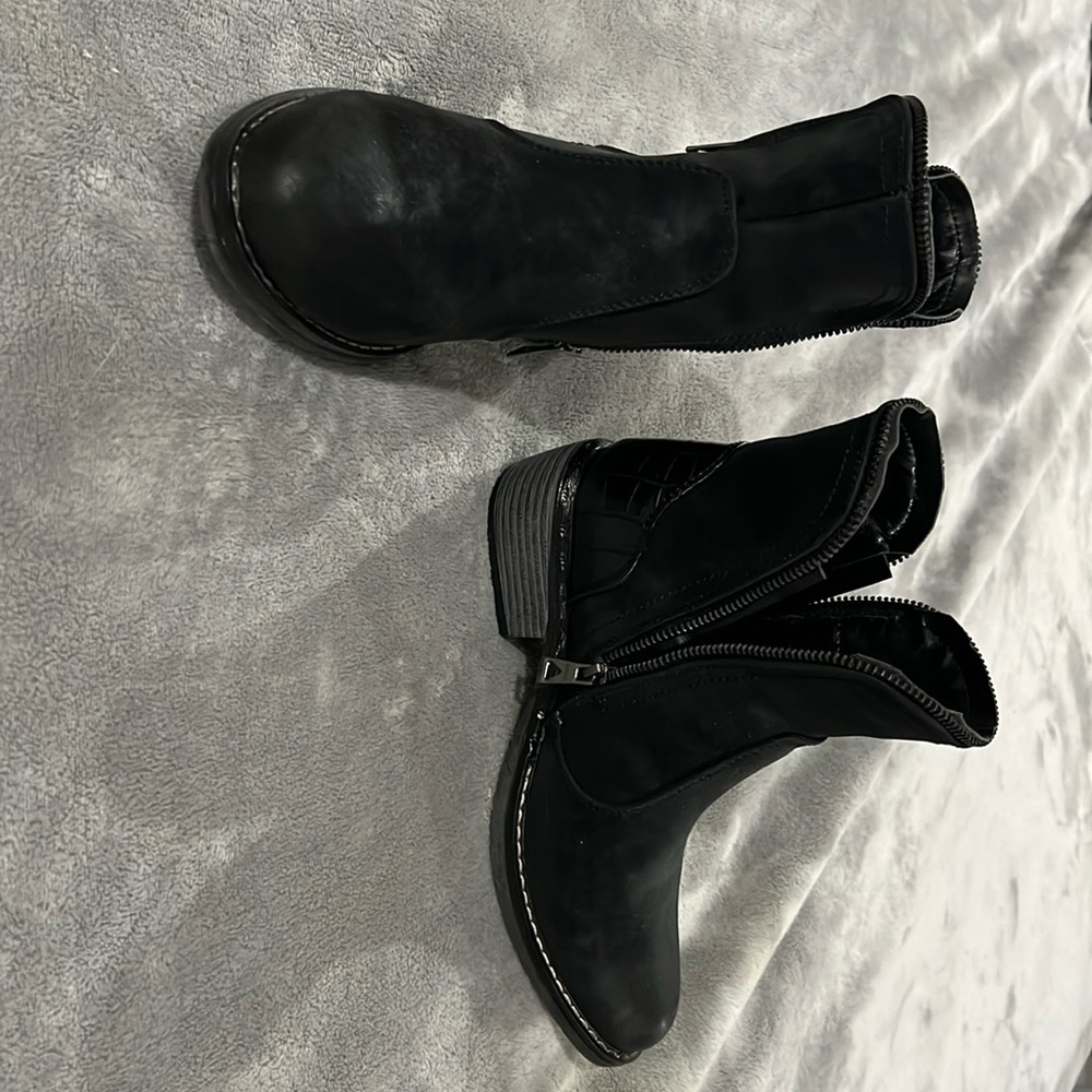 One pair black suede and leather boots. Only worn once.